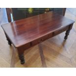 A large reproduction "Victorian" style coffee table, turned legs, short drawers to frieze, 130cm