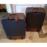 Pair of Mulberry leather suitcases model 031694C, 50cm wide x 26 cm deep x 75 cm long, AF
