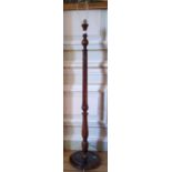 An Edwardian mahogany standard lamp, reeded column