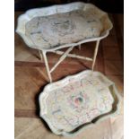 A contemporary decorative Papier-mâché style tray table, the ray decorated with red, green &