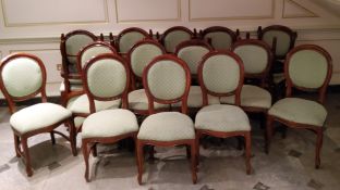 A suite of Napoleon III inspired mahogany medallion back conference/ parlour chairs having a