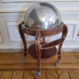 A 1940's domed carving trolley, vented dome with stainless steel spiked carving surface, meat