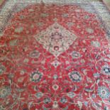 A hand knotted Persian Kashan carpet 400cm x 300cm