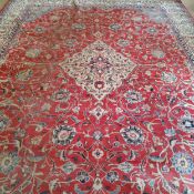 A hand knotted Persian Kashan carpet 400cm x 300cm