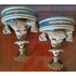 A pair of decorative Roccoco style wall sconces