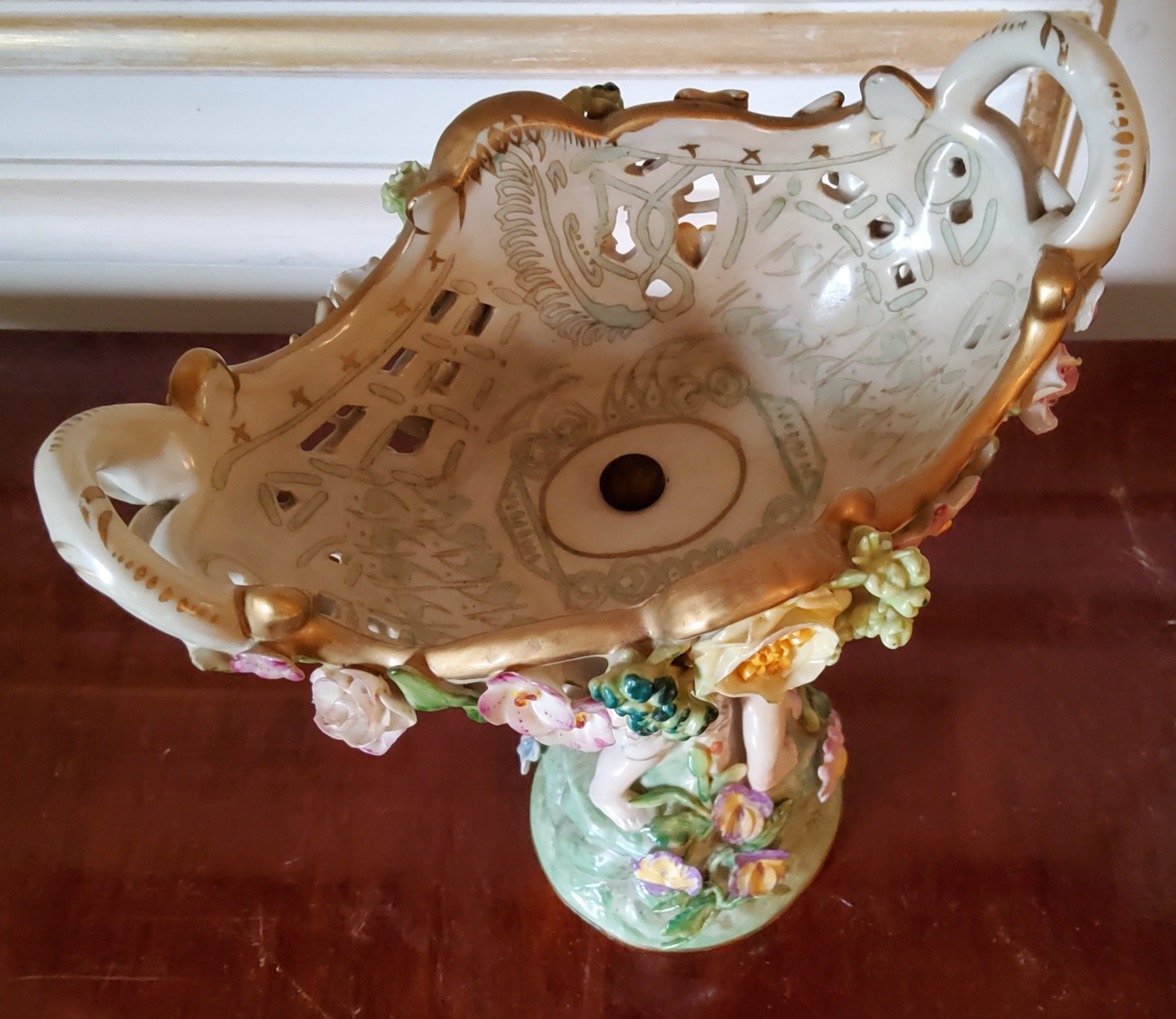 A Meissen centre piece with entwined putti supporting a central pierced bowl with applied flowers, - Image 5 of 6