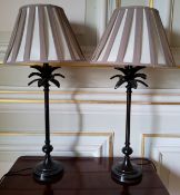 A pair of black/brown metal table lamps in the form of a palm tree, 51cms high excluding shades (PAT