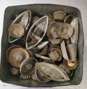 A large number of catering/ pastry moulds, and a varied collection of stainless steel and silver