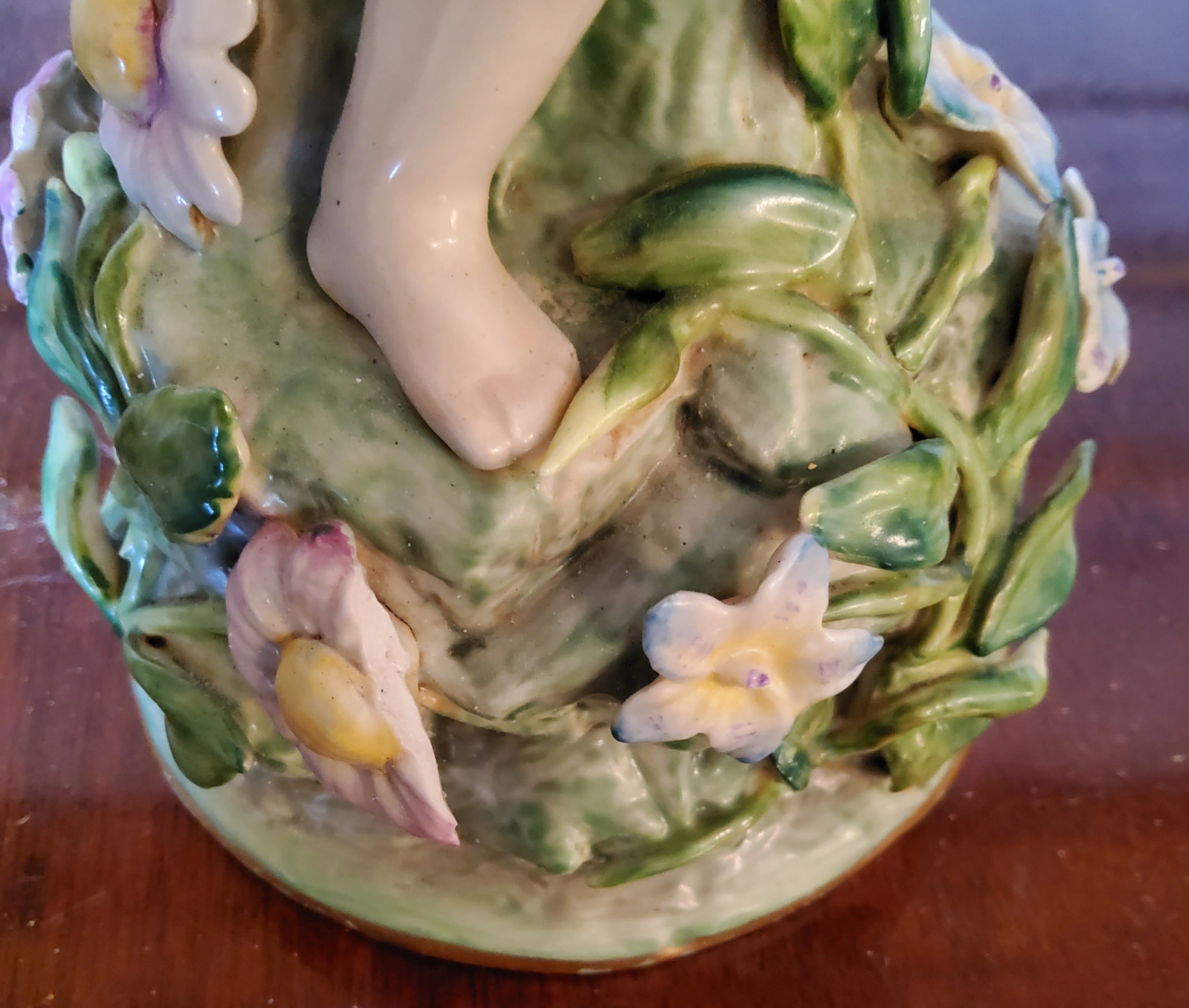 A Meissen centre piece with entwined putti supporting a central pierced bowl with applied flowers, - Image 2 of 6