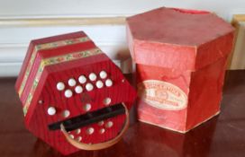 A German BM 20 key concertina, decorated with roses, leather strap original card box
