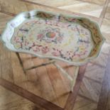 A contemporary decorative Papier-mâché style tray table, the ray decorated with red, green &