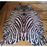 A Zebra skin rug
