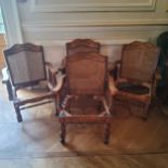 A set of four French bergere tub chairs, woven rattan back with 'antiqued' frames, lacking seat