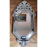 A Venetian style etched octagonal mirror 140 x 72cms