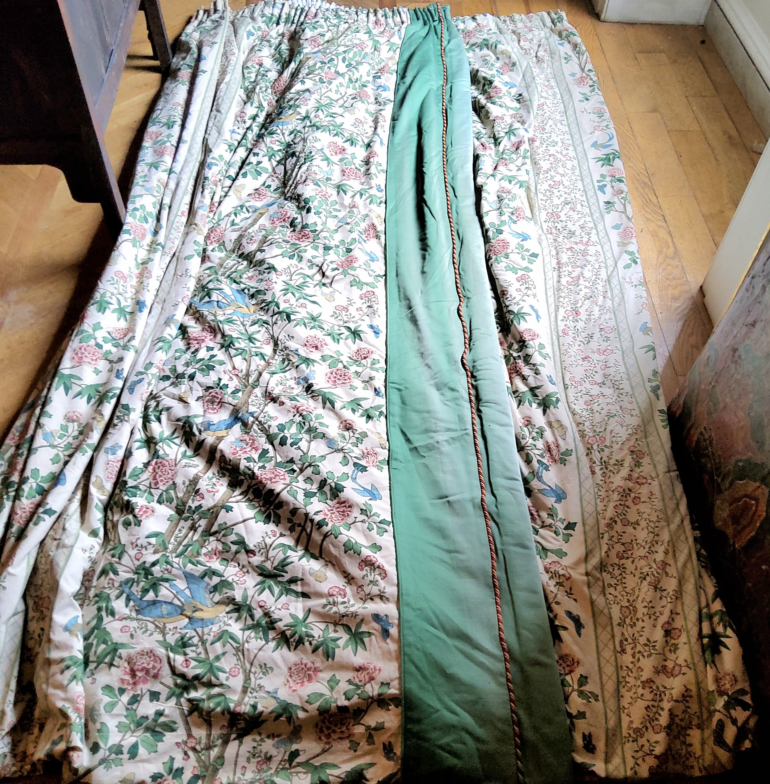 A pair of heavy pencil pleat curtains, the cotton fabric printed with doves & other birds,