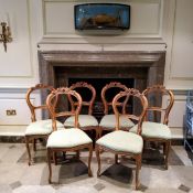 A suite of six Louis XVI style balloon back parlour chairs