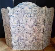 A decorative triptych table/fire screen with a toile de jouy style blue and white design