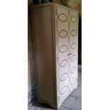 A 'Kerala' Double Wardrobe, linen covered with decorative studwork panels, 206cm x 106cm x 56cm