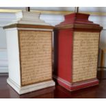 A pair of ceramic table lamps of squat column form, one red and gilt the other cream, the front