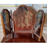 A Victorian style mahogany triptych dressing table mirror, acorn finials, scroll legs