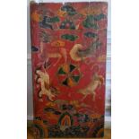 Himalayan Art - A 19th century Tibetan temple door panel, vibrantly hand painted with a central