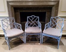 Three 'George III' Chinese Chippendale Revival faux bamboo elbow chairs painted and distressed