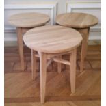 A set of three circular light oak pub/tavern tables, dia 61cm x height 66cm