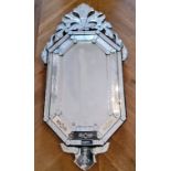 A Venetian style etched octagonal mirror 140 x 72cms