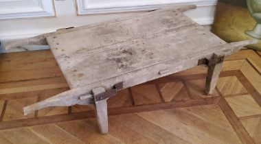A rustic farmhouse display stand/butcher's trolley