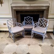 Three 'George III' Chinese Chippendale Revival faux bamboo elbow chairs painted and distressed