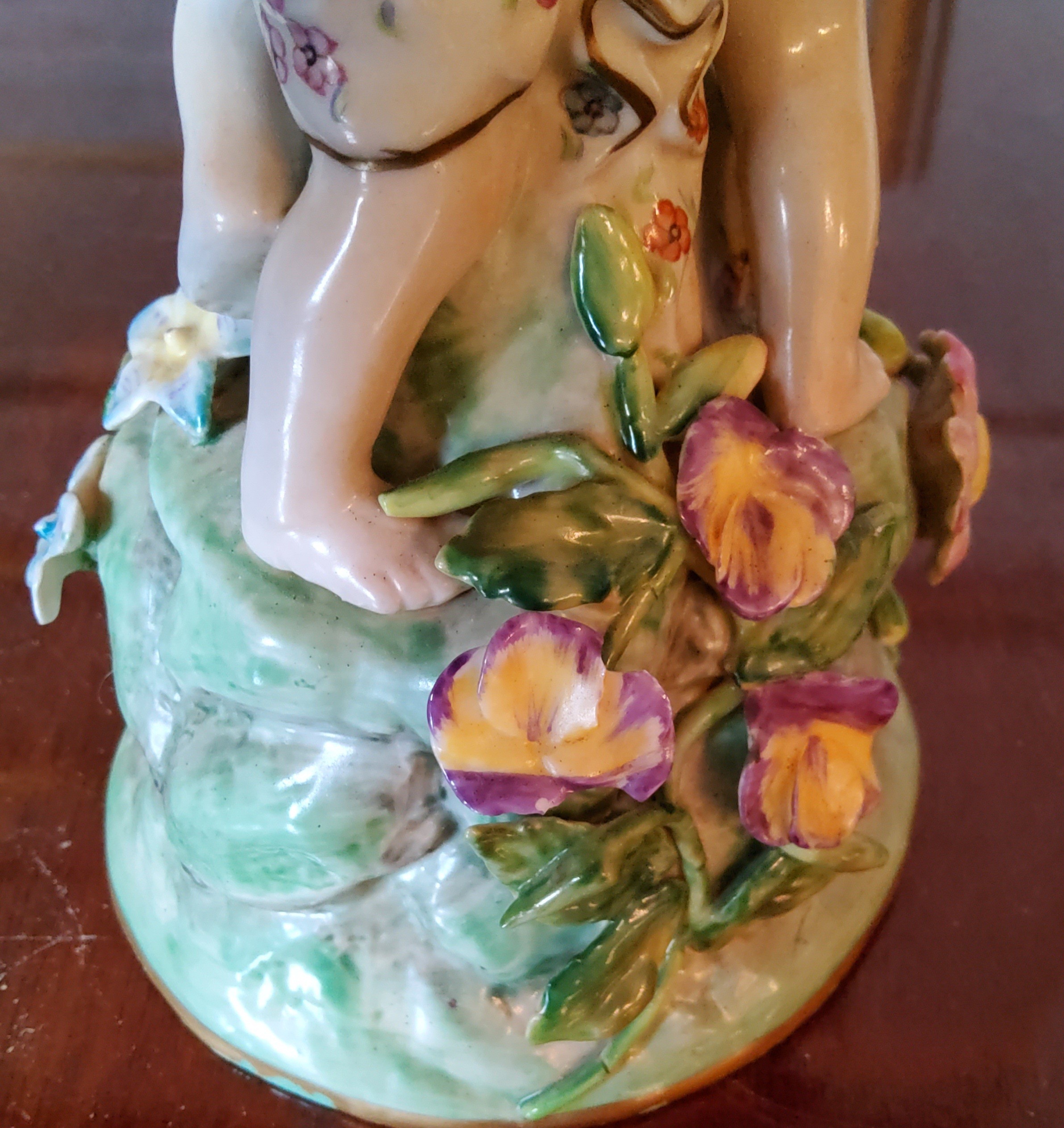 A Meissen centre piece with entwined putti supporting a central pierced bowl with applied flowers, - Image 3 of 6