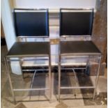 A modern pair of chrome and black leatherette bar stools, 41cm w x 38cm d x 96cm h