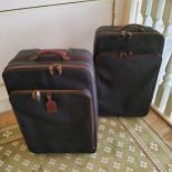 Pair of Mulberry leather suitcases model 031694C, 50cm wide x 26 cm deep x 75 cm long, AF