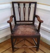 A late 18th/early 19th century country house elbow chair, wooden peg dowels, circa 1800. 87cm