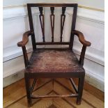 A late 18th/early 19th century country house elbow chair, wooden peg dowels, circa 1800. 87cm