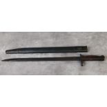 A WWI 1917 Remington bayonet and scabbard stamped US