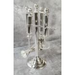 An Art Style Silver plated bartender comprising set, spirit measure, scoop, corkscrew & bottle