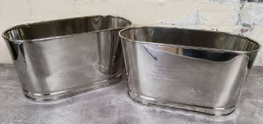 A pair of oval champagne/wine ice buckets, one side etched with Napoleon's family crest above 'I