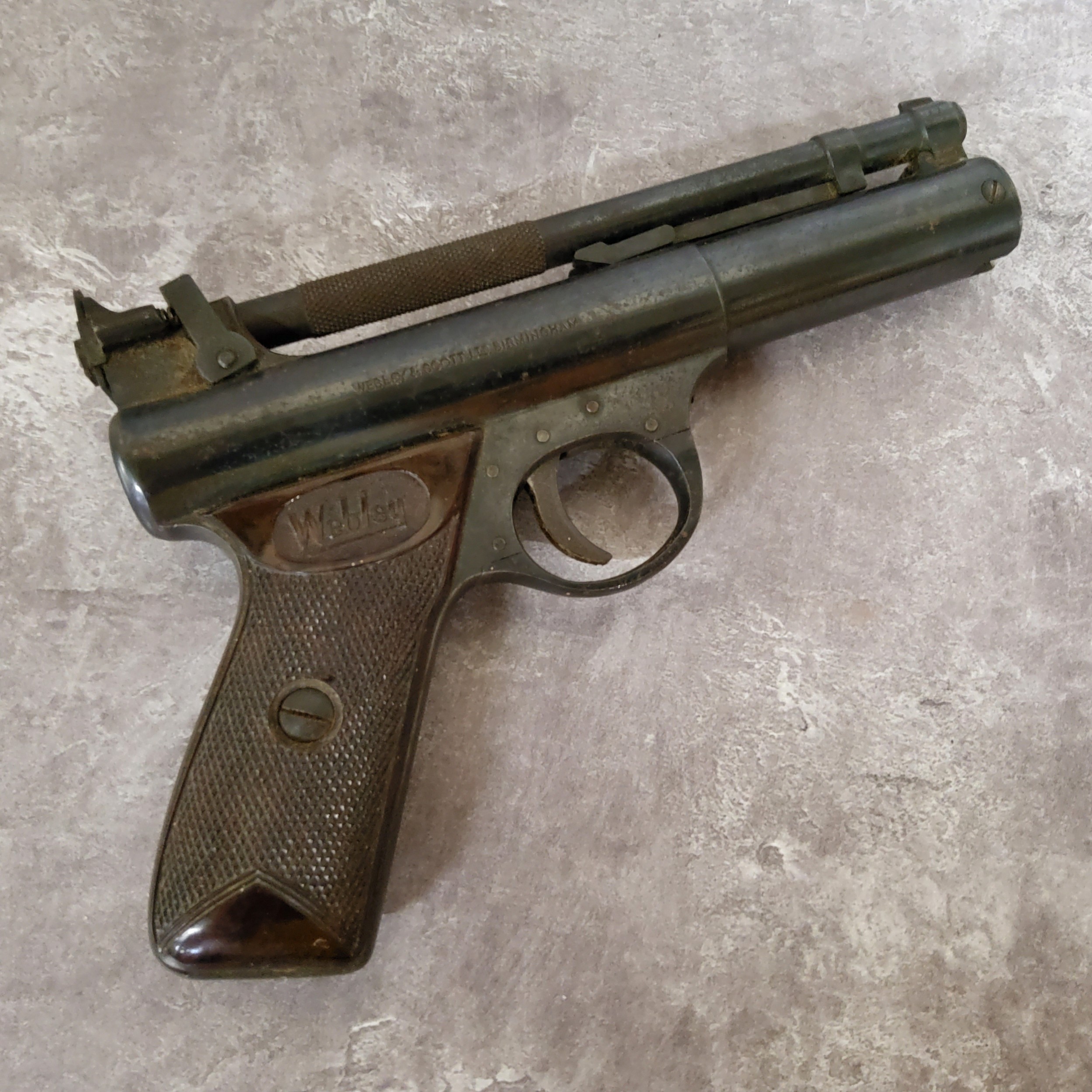 A .22? Webley Premier Series ?E? air pistol, number 213 and numbers ?2 1? beneath left grip, with