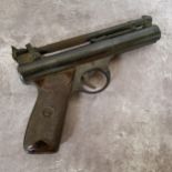 A .22? Webley Premier Series ?E? air pistol, number 213 and numbers ?2 1? beneath left grip, with