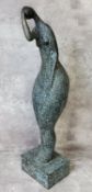 A verdigris bronze abstract nude raised on a plinth base, 62cms high