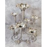 An early 20th century silver plated epergne, the central trumpet flanked six further trumpets each