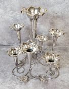 An early 20th century silver plated epergne, the central trumpet flanked six further trumpets each