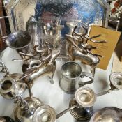 Silver plate including a pair of open barley twist candlesticks, tankard, letter rack, grape