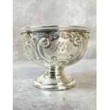 A silver communion cup, embossed in relief decoration, engraved PGC 1938, Francis Howard,