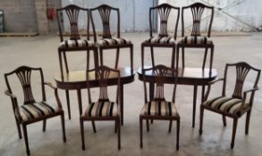 A pair of George III mahogany D-ends and a set of 8 Hepplewhite style dining chairs
