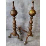A pair of late 19th century substantial brass andirons