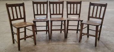 A set of five full sized school chairs