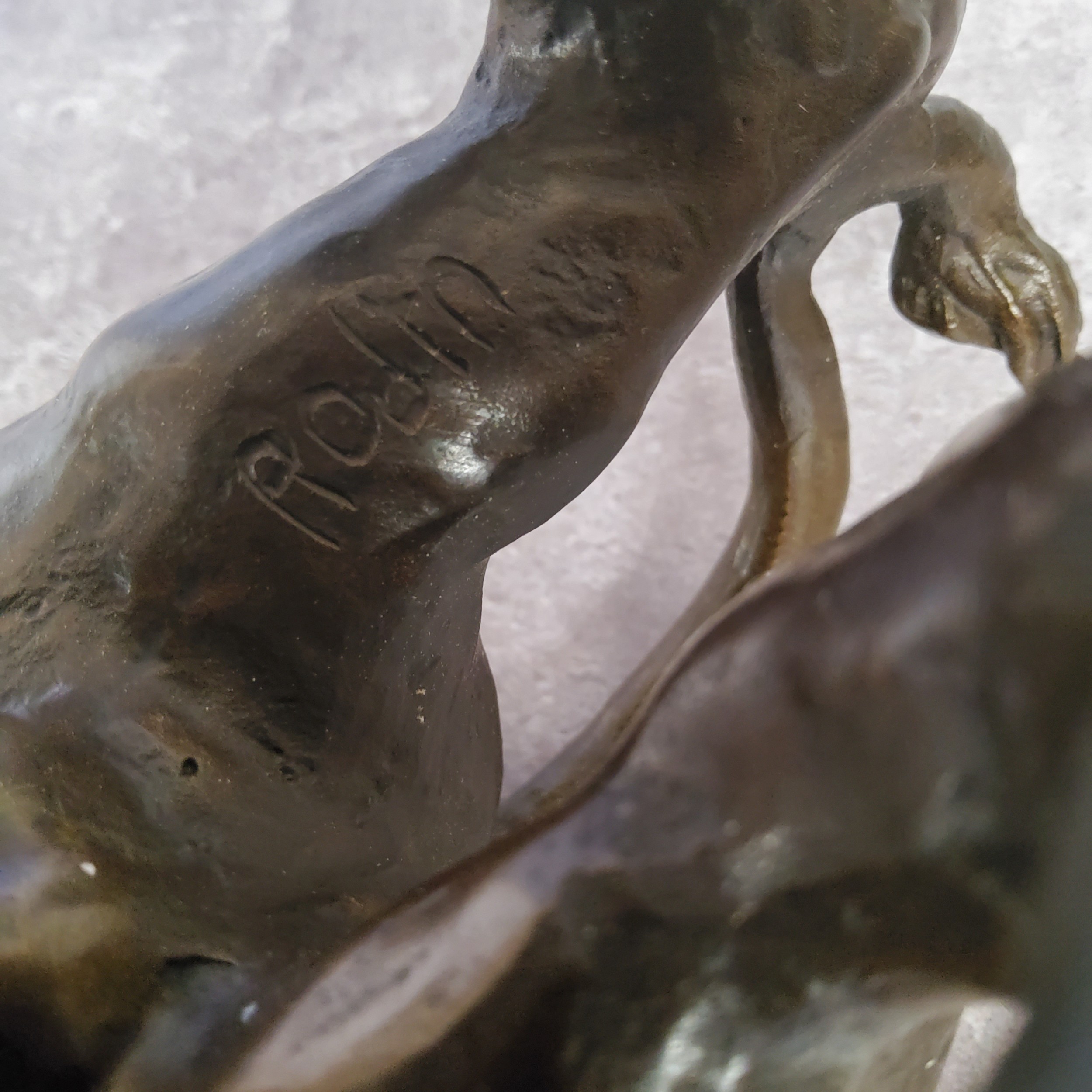 A bronze library model of a ferocious lion, bearing the signature, Rodin 31cm in length - Image 2 of 4