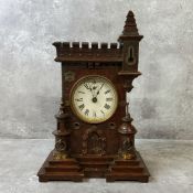 Junghans oak novelty mantel or bracket clock in the form of a castle, circa 1900, with 5-inch